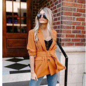 Kittenish orange blazer
